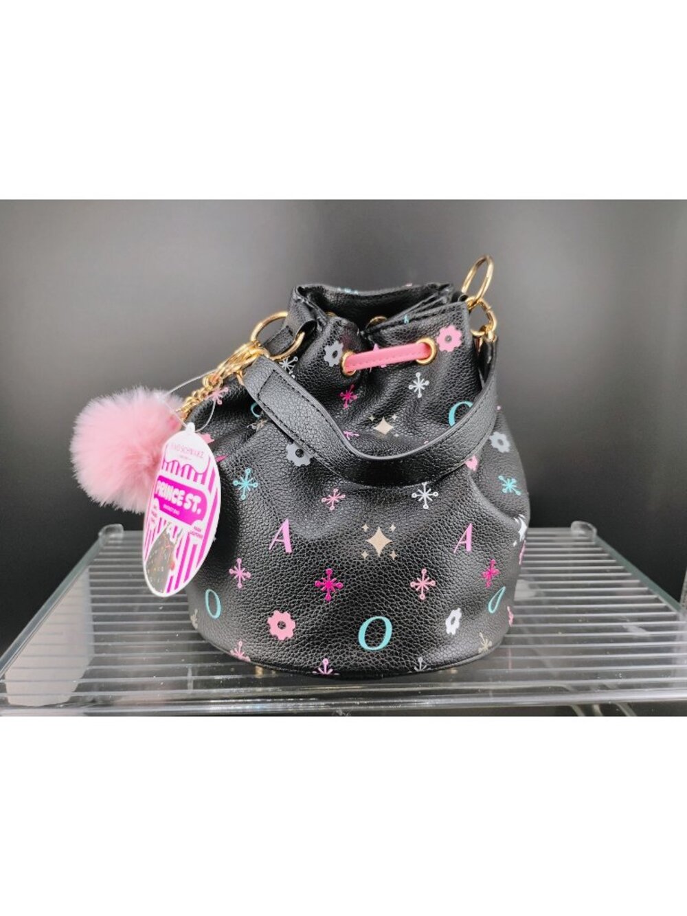 FAO Schwarz Prince St. Black Bucket Bag W/ Pink Pom & Print Design